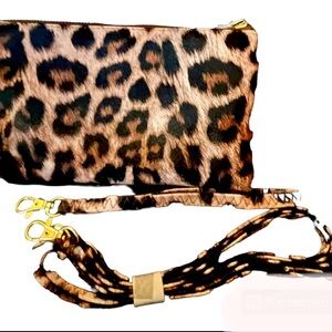 Crossbody in a beautiful leopard print. NWOT, Never Used, Excellent Condition!